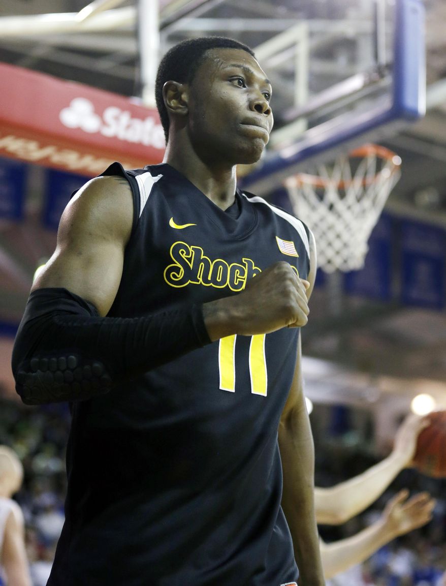 Wichita State forward Cleanthony Early reacts after making a basket during the first half of an NCAA college basketball game against Drake, Saturday, Jan. 25, 2014, in Des Moines, Iowa. (AP Photo/Charlie Neibergall)