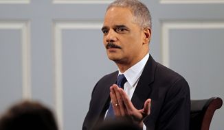 Attorney General Eric H. Holder Jr. will issue guidance giving wiggle room to banks that work with marijuana clients in violation of federal banking laws. (ASSOCIATED PRESS)