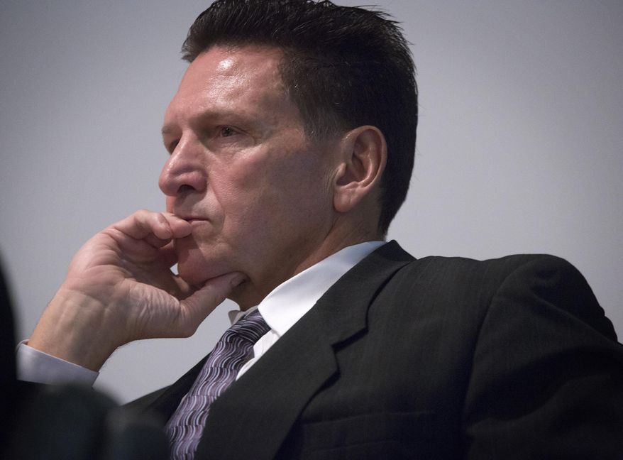 File-In this file photo taken on Monday, Dec. 2, 2103, suspended Clark County Family Court judge Steven Jones attends his Nevada Commission on Judicial Discipline hearing in Las Vegas. A lawyer for Johnes told a state disciplinary panel that his client won't seek re-election after all. Jones is in a Nevada Commission on Judicial Discipline hearing Monday Jan. 27, 2014, with the panel considering his punishment for presiding over cases handled by a prosecutor he was dating. (AP Photo/Las Vegas Review-Journal, Jeff Scheid,File) LOCAL TV OUT; LOCAL INTERNET OUT; LAS VEGAS SUN OUT