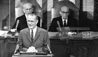 FILE - This Jan. 12, 1966 file photo shows President Lyndon Baines Johnson giving his State of the Union address on Capitol Hill in Washington. Is “strong” losing its strength? Presidents of both parties have long felt compelled to sum up the state of the union with a descriptive word or two in their State of the Union addresses. Mostly the same word. For many years now, “strong” has been the go-to adjective. House Speaker John McCormack of Mass. is at left, Sen. Carl Hayden, D-Ariz. is at right. (AP Photo, File)
