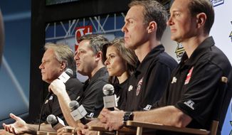 Driver/owner Tony Stewart, second from left, speaks as co-owner Gene Haas, left, and drivers, from right, Kurt Busch, Kevin Harvick and Danica Patrick listen during a news conference at the NASCAR Sprint Cup auto racing Media Tour in Charlotte, N.C., Monday, Jan. 27, 2014. (AP Photo/Chuck Burton)