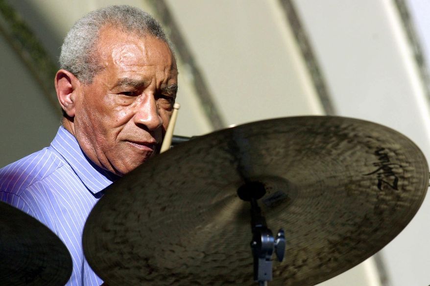 FILE - This June 16, 2001 file photo, shows Max Roach performing at the Playboy Jazz Festival at the Hollywood Bowl in Los Angeles. Music and records from one of the creators of modern jazz drumming, Max Roach, will be preserved at the Library of Congress. On Monday, the library announced the acquisition of Roach’s collection from his body of work over several decades. It includes more than 100,000 items, including 80,000 manuscripts and papers, as well as photographs, music manuscripts and hundreds of sound and video recordings. (AP Photo/Kevork Djansezian, File)