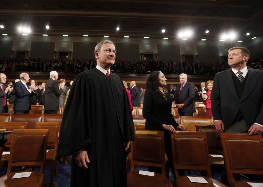 Supreme Court Chief Justice John Roberts arrives for President Barack Obama&#x27;s State of Union address before a joint session of Congress in the House chamber Tuesday, Jan. 28, 2014. (AP Photo/Larry Downing, Pool)