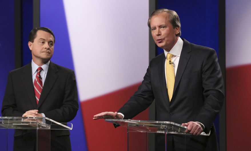 Republican Texas lieutenant governor candidates Agricultural Commissioner Todd Staples looks on as Lt. Gov. David Dewhurst speaks during a debate at KERA studios in Dallas, Monday, Jan. 27, 2014. The four Republican candidates are vying to be Texas lieutenant governor, a post considered to be the most powerful in the state. (AP Photo/LM Otero,Pool)