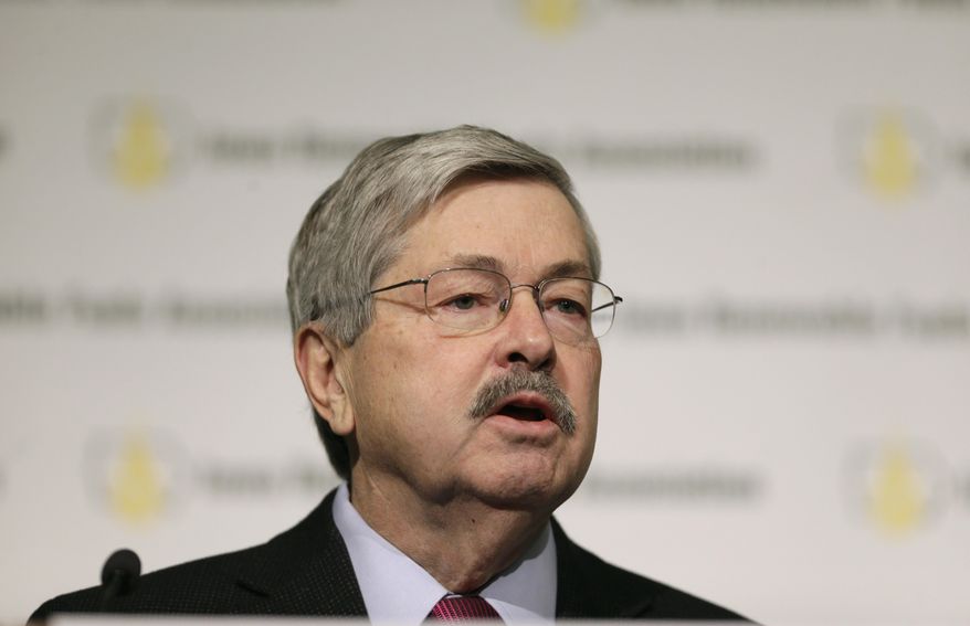 Iowa Gov. Terry Branstad speaks during the Iowa Renewable Fuels Association Summit, Tuesday, Jan. 28, 2014, in Altoona, Iowa. Branstad says he feels momentum is with Iowa and other farm states pushing the EPA to reverse a plan to cut the amount of biofuels blended into gasoline this year. (AP Photo/Charlie Neibergall)