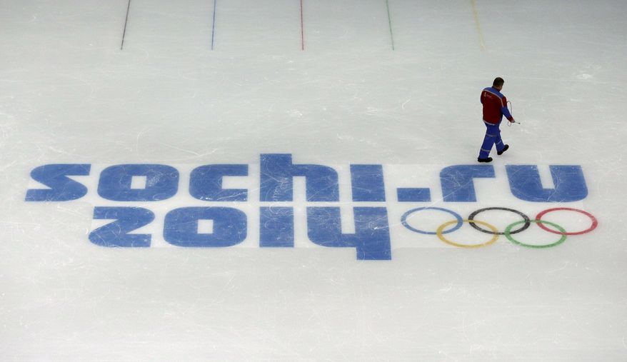 FILE - This is a Saturday, Jan. 25, 2014, file photo of a worker leaving after checking ice conditions at the Iceberg Skating Palace, where the figure skating and short track speed skiing will take place, at the 2014 Winter Olympics in Sochi, Russia. The Olympics begin Feb. 7th. You'd have to be a dope to try to get away with doping at the Sochi Olympics. That's the picture painted by international Olympic and anti-doping officials as they implement the toughest drug-testing program in Winter Games history.Using intelligence to target athletes and events considered most at risk, authorities are focusing their efforts on weeding out drug cheats through rigorous pre-games and pre-competition tests. (AP Photo/David J. Phillip, File)