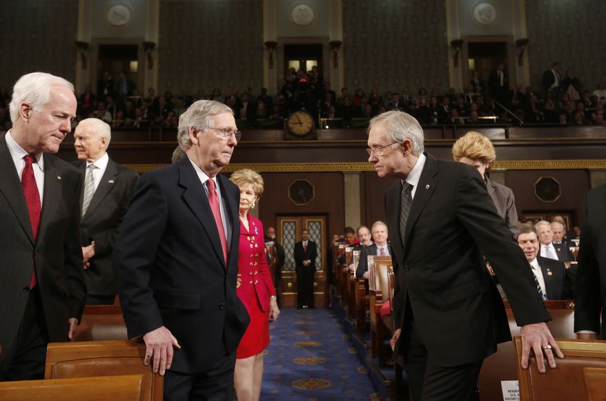 U.S. Senate Minority Whip John Cornyn (L), Senate Minority Leader Mitch McConnell (2nd L) and Senate Majority Leader Harry Reid (R) head to the front of the chamber together before President Barack Obama delivers his State of the Union speech on Capitol Hill in Washington, January 28, 2014. REUTERS/Larry Downing (UNITED STATES - Tags: POLITICS)