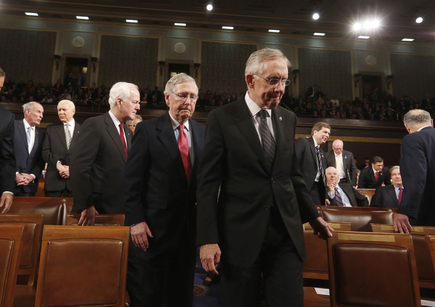 Senate Majority Leader Harry Reid (R) leads Senate Minority Leader Mitch McConnell (2nd R) and Minority Whip John Cornyn (3rd R) to the front of the chamber before President Barack Obama delivers his State of the Union speech on Capitol Hill in Washington, January 28, 2014. REUTERS/Larry Downing (UNITED STATES - Tags: POLITICS)