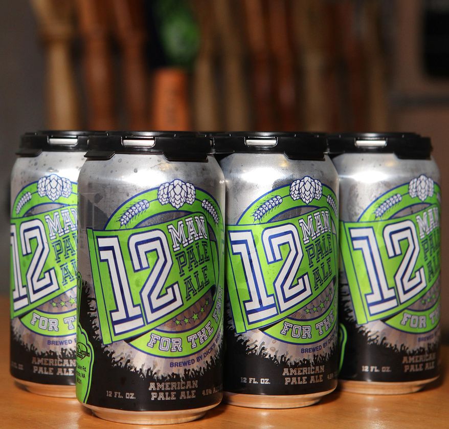 This Jan. 28, 2014 photo shows Dick's Brewing in Centralia,Wash 12 Man Pale Ale. As the Seattle Seahawks prepare for Super Bowl XLVIII, the Centralia-based microbrewery is scoring big with a beer made just for fans. Dick's Brewing Co. officially released 12 Man Pale Ale in December. Packaged in 12-ounce cans, the beer has quickly become a top seller. The brewery has shipped more than 6,000 cans and 300 kegs so far in January. (AP Photo/The Olympian, Steve Bloom)