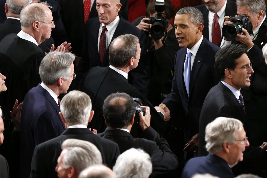 Chief Justice John Roberts greets President Barack Obama before the president gave his State of the Union address on Capitol Hill in Washington, Tuesday Jan. 28, 2014. (AP Photo/Charles Dharapak)