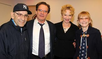 This 2013 image released by Polk PR shows , from left, baseball legend Yogi Berra, actor Peter Scolari, his wife, actress Tracy Shayne and Carmen Berra at the Yogi Berra Museum &amp;amp; Learning Center at Montclair State University in Montclair, N.J. Scolari and Shayne portray the Berras in the play &amp;quot;Bronx Bombers,&amp;quot; which examines the rich history of the New York Yankees.  (AP Photo/Polk PR, Bruce Glikas)