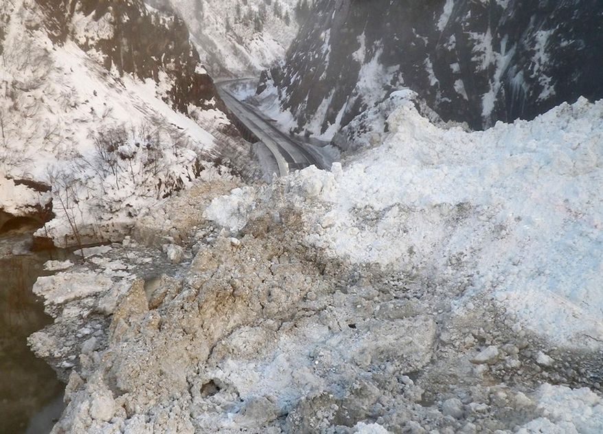 APhoto released Wednesday Jan. 29, 2014, by the Alaska Department of Transportation & Public Facilities and made on Jan. 25, 2014, is of snow and ice covering the closed Richardson Highway, near Valdez, Alaska. One of a number of avalanches covered the roadway in the Keystone Canyon, closing the only road access to Valdez, the city at the end of the trans-Alaska pipeline. Alaska authorities said snow 40 feet deep and 1,000 to 1,500 feet long covered the highway. (AP Photo/Alaska DOT&PF)