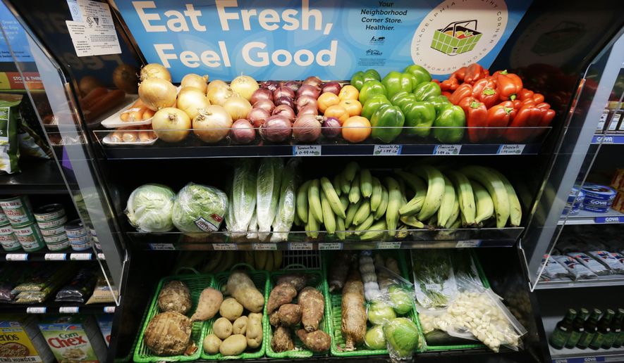The issue of “food deserts” — which the U.S. Department of Agriculture defines as areas lacking fresh fruit, vegetables and other whole foods — came into the spotlight earlier this year in a separate D.C. Policy Center report on the availability of healthful food in the city. The March report shows that 11.3 percent of the District is considered a food desert. And more than three-quarters of the food deserts in the District are located east of the Anacostia River in Wards 7 and 8. (AP Photo/Matt Rourke)