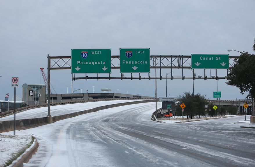 Bridges are frozen and ice covers downtown Mobile, Ala., as temperatures remain below freezing on Wednesday Jan. 29, 2014. The ice and snow storm that hit Alabama was wider and more severe than some officials expected. (AP Photo/AL.com, Sharon Steinmann) MAGS OUT