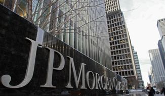 **FILE** A JP Morgan Chase building sign is seen in New York on Feb. 4, 2011. (Associated Press)