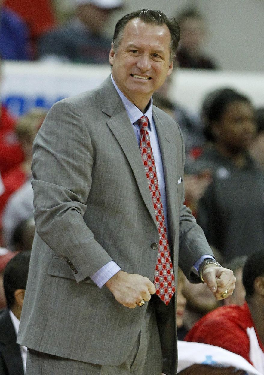 N.C. State's Mark Gottfried gestures during the first half of an NCAA basketball game, Wednesday, Jan. 29, 2014 in Raleigh, N.C. (AP Photo/The News & Observer, Ethan Hyman) MANDATORY CREDIT: ETHAN HYMAN, THE NEWS & OBSERVER