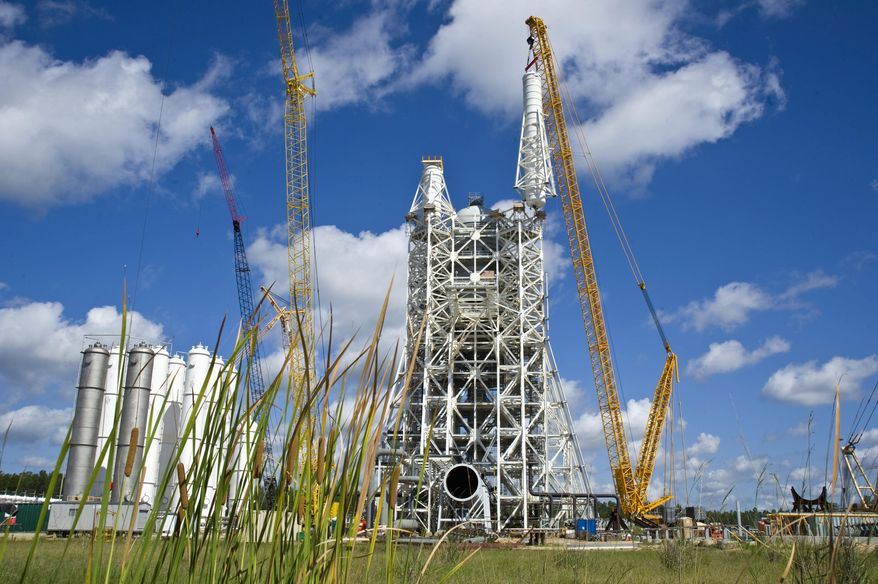Sky-High costs: The A-3 tower at Stennis Space Center is designed to test how rocket engines operate at altitudes of up to 100,000 feet. Although NASA is compelled to complete the $350 million project, the tower will be mothballed. (NASA)