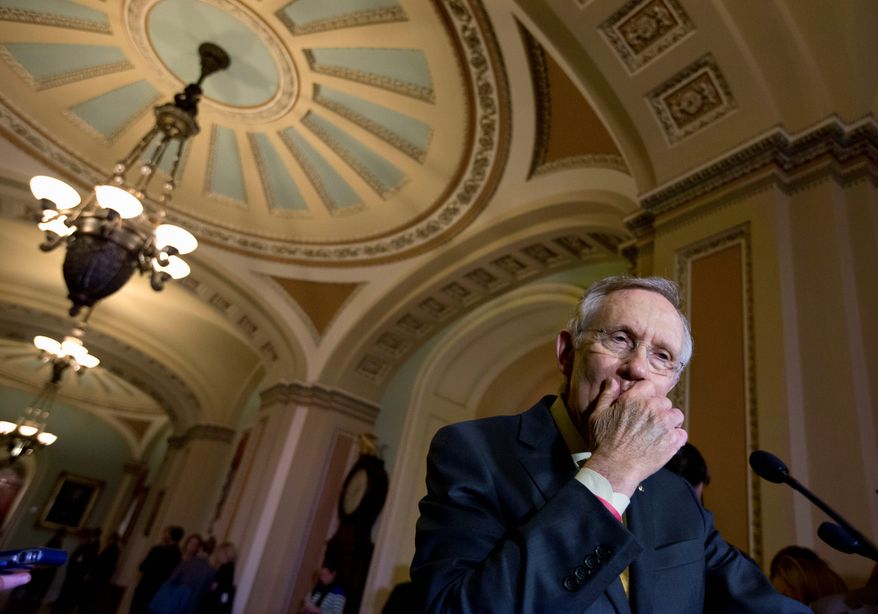 Senate Majority Leader Harry Reid rejected giving President Obama "fast-track" authority that would limit lawmakers to an up-or-down vote on trade deals, without amendments. "I think everyone would be well-advised just not to push this right now," said the Nevada Democrat. (ASSOCIATED PRESS PHOTOGRAPHS)