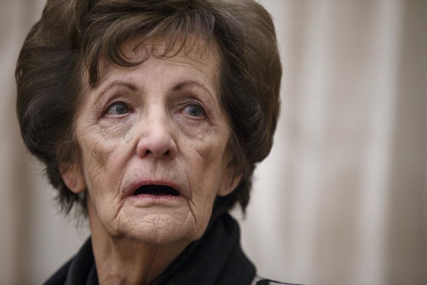 Philomena Lee, an Irish woman whose search for the son that she gave up for adoption in the 1950’s, and is now a Hollywood film, meets with Sen. Claire McCaskill, D-Mo. on Capitol Hill in Washington, Thursday, Jan. 30, 2014. With her life story now the subject of an Oscar-nominated film, Philomena Lee is calling for government reforms in Ireland that would grant adopted people access to their adoption files. At far left is Mari Steed, with the Adoption Rights Alliance. (AP Photo)