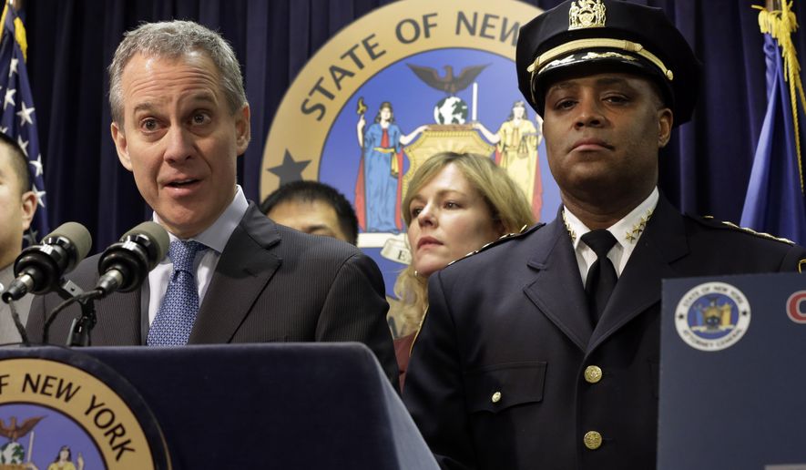 New York Attorney General Eric Schneiderman, is joined by New York City Police Dept. Chief of Department Philip Banks during a news conference, in New York, Thursday, Jan. 30, 2014.  Police were rounding up 18 people in New York City on Thursday on allegations they sold "party packs" of cocaine and sex to high-end clients and texted their customers to advertise ahead of this week's Super Bowl festivities. (AP Photo)