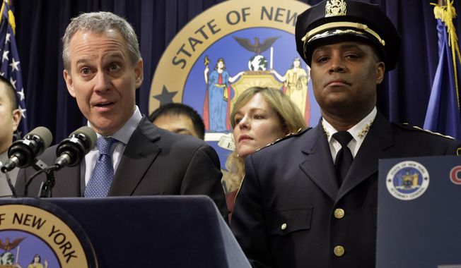 New York Attorney General Eric Schneiderman, is joined by New York City Police Dept. Chief of Department Philip Banks during a news conference, in New York, Thursday, Jan. 30, 2014.  Police were rounding up 18 people in New York City on Thursday on allegations they sold "party packs" of cocaine and sex to high-end clients and texted their customers to advertise ahead of this week's Super Bowl festivities. (AP Photo)
