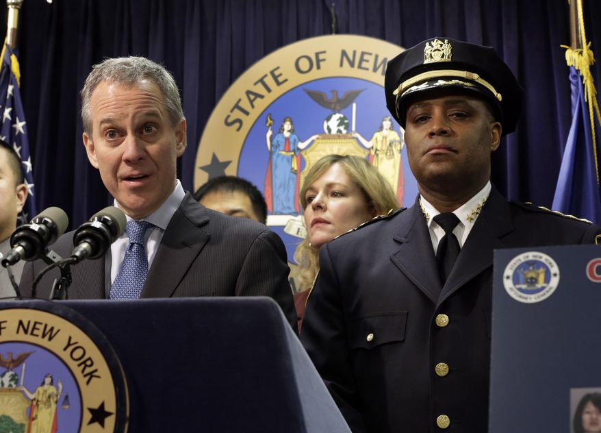 New York Attorney General Eric Schneiderman, is joined by New York City Police Dept. Chief of Department Philip Banks during a news conference, in New York, Thursday, Jan. 30, 2014. Police were rounding up 18 people in New York City on Thursday on allegations they sold "party packs" of cocaine and sex to high-end clients and texted their customers to advertise ahead of this week's Super Bowl festivities. (AP Photo)