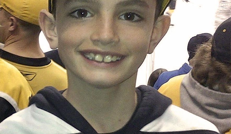 FILE - This April 11, 2013 photo provided by the Richard family shows, Martin Richard, 8, in Boston. Martin was the youngest of three people killed in the  Monday, April 15, 2013, bombings near the finish line of the Boston Marathon. The charitable foundation started by his parents announced Thursday, Jan. 30, 2014, it had selected 72 runners from more than 250 people in 35 states and several other countries who submitted 11-page applications to run as a team in the marathon on April 21, 2014. Charity teams are forming to run in honor of victims of the bombings at last year&#39;s race. (AP Photo/Bill Richard, File)