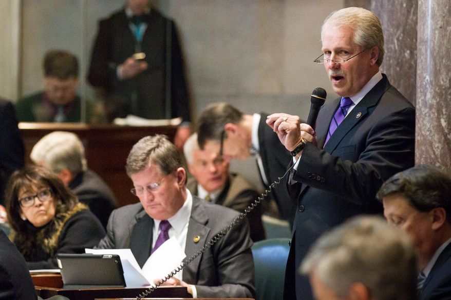 Sen. Bill Ketron, R-Murfreesboro, discusses his bill to allow supermarket wine sales during a Senate floor session in Nashville, Tenn., on Thursday, Jan 30, 2014. The chamber later passed the measure. (AP Photo)
