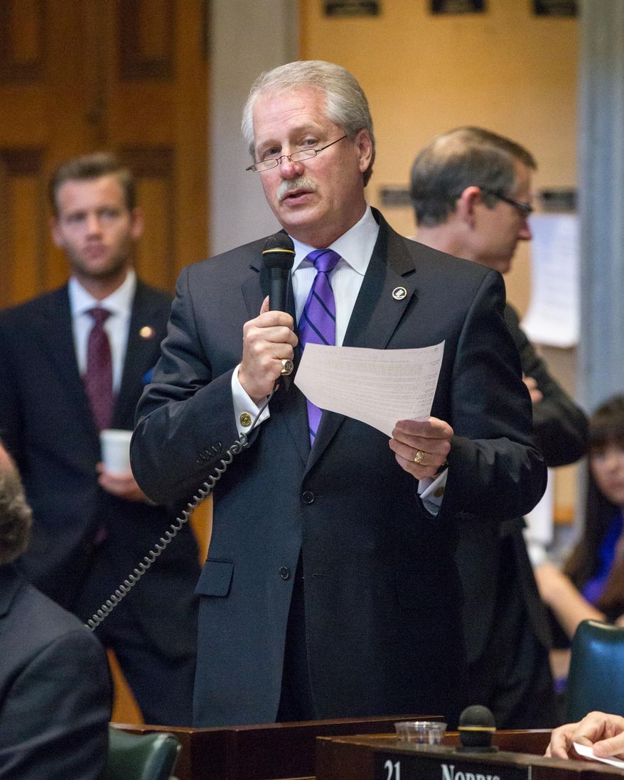 Sen. Bill Ketron, R-Murfreesboro, discusses his bill to allow supermarket wine sales during a Senate floor session in Nashville, Tenn., on Thursday, Jan 30, 2014. The chamber later passed the measure. (AP Photo)