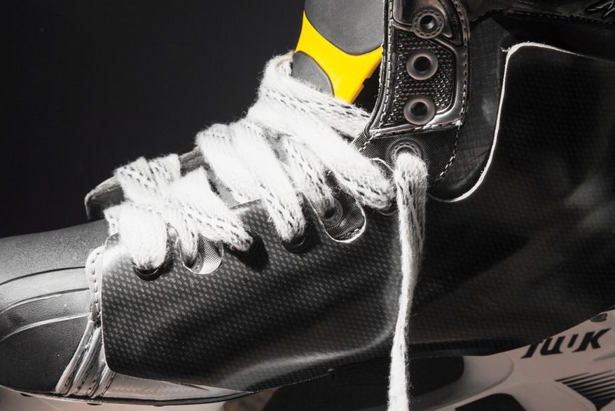 ADVANCE FOR WEEKEND EDITIONS, FEB. 1-2 - This undated product shot released by Exterior Skate Protection, shows the Shotblocker XT Pro hockey skate protector. According to the company's website, numerous NHL teams are using the equipment to help protect players ankles and feet from getting injured by flying pucks. Shot-blocking is one of the sport's under appreciated skills, but it can come with a price, as in a bruised or broken foot and an absence from the ice for days or weeks. (AP Photo/Exterior Skate Protection)