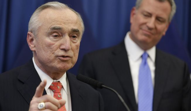 FILE -  In this Dec. 5, 2013 file photo, William Bratton, left, speaks while New York Mayor Bill de Blasio looks on during a news conference in New York introducing Bratton as de Blasio's choice for New York City police commissioner.  Presiding over his first promotion ceremony on Friday, Jan. 31, 2014, Bratton told his audience that he's committed to reshaping the NYPD's crime-fighting strategy of aggressive street stops to make it more respectful of the public. He also said he wants more collaboration with the powerful Patrolmen's Benevolent Association.(AP Photo/Seth Wenig, File)