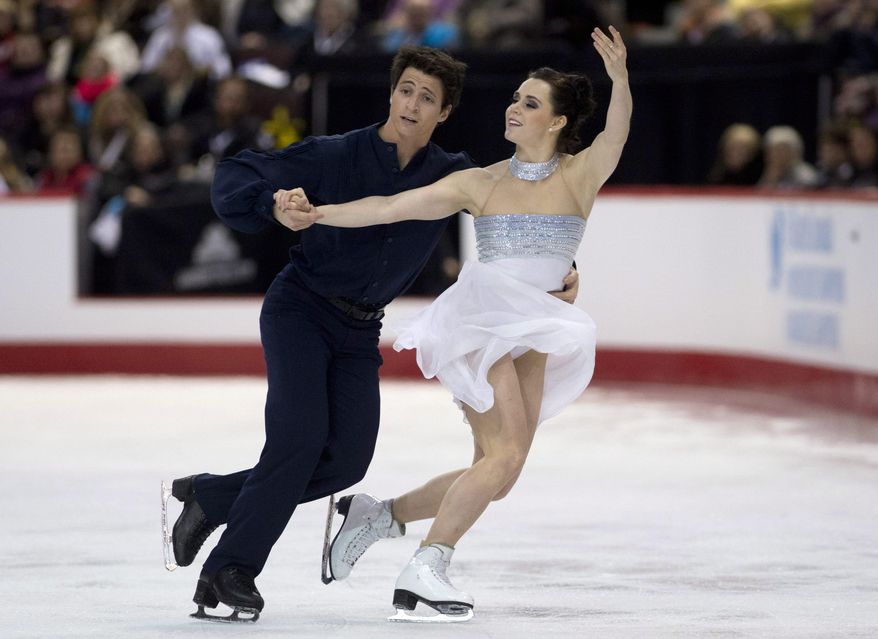 FILE - In this Jan. 11, 2014 file photo, Scott Moir and Tessa Virtue perform their free program in dance competition at the Canadian figure skating championships in Ottawa. The pair began skating together in 1997 when Moir was 9 and Virtue was 7, and now, after an Olympic gold medal in 2010 and two world titles, they're expected to retire after Sochi, closing the book on a partnership that has spanned nearly two decades. (AP Photo/The Canadian Press, Adrian Wyld, File)