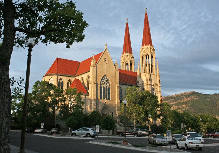 ** FILE ** This 2011 file photo provided by Ron Zellar, shows the Cathedral of St. Helena in Helena, Mont. The Roman Catholic Diocese of Helena filed for bankruptcy protection Friday Jan. 31, 2014, in advance of proposed settlements for two lawsuits that claim clergy members sexually abused 362 people over decades and the church covered it up. (AP Photo/Ron Zellar,File)