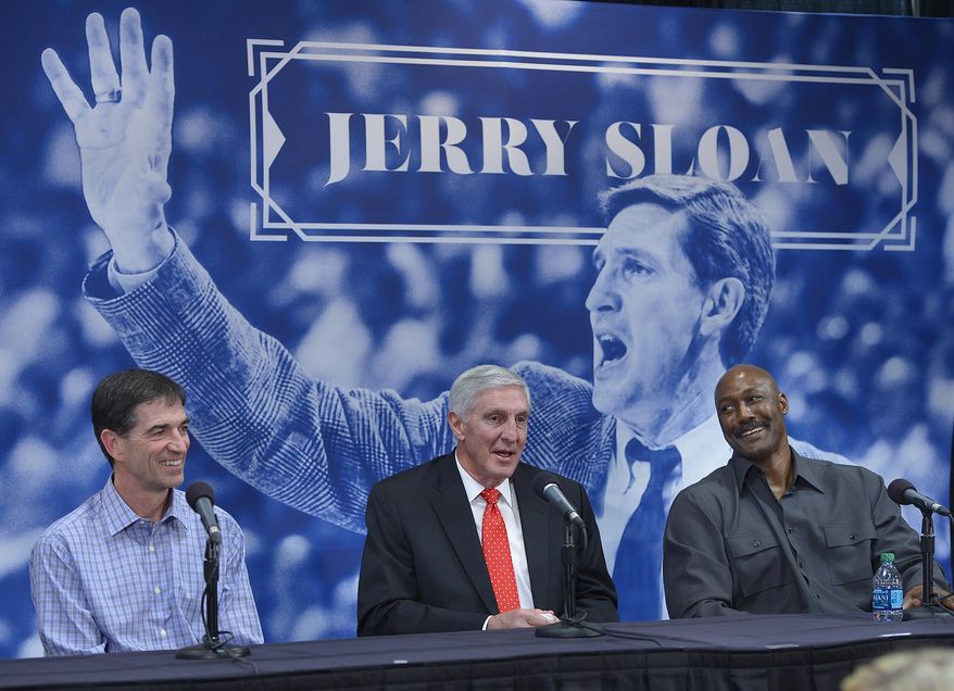 John Stockton, left, and Karl Malone, right, laugh during a news conference to honor former Utah Jazz coach Jerry Sloan, center,  on Friday, Jan. 31, 2014, in Salt Lake City.  (AP Photo/The Salt Lake Tribune, Scott Sommerdorf) LOCAL TV OUT; MAGAZINES OUT; DESERET NEWS OUT