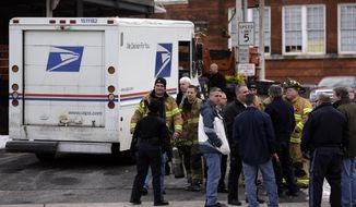 Law enforcement and other emergency personnel gather outside a post office Friday, Jan. 31, 2014, in Rutherford, N.J. White powder was mailed to businesses near the site of Sunday&#39;s Super Bowl, prompting an investigation by the FBI and other law enforcement. A federal law enforcement official said one of the envelopes contained baking soda. (AP Photo/Jeff Roberson)