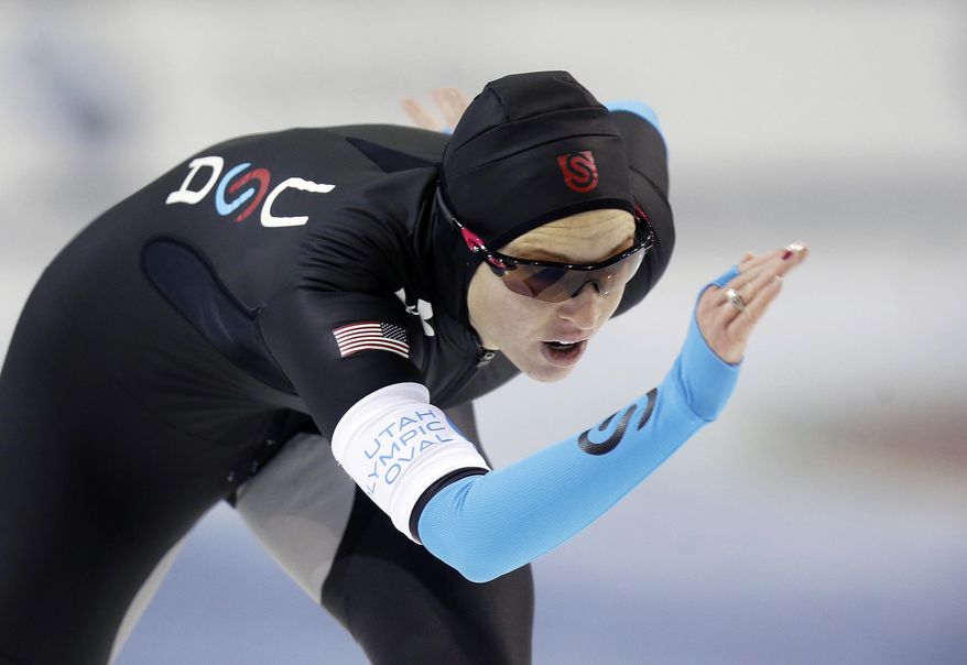 FILE-In this Sunday, Dec,. 29, 2013, file photo, Kelly Gunther, of the United States, competes in the women's 1,000 meters during the U.S. Olympic speedskating trials in Kearns, Utah. Three native Ohioans will be competing for the United States in the upcoming Olympics in Russia. The three women all come from hometowns in northeast Ohio. Gunther is making her Olympic debut after coming back from a serious ankle injury four years ago. She will compete in the 1,000-meter speedskating event. (AP Photo/Rick Bowmer, File)