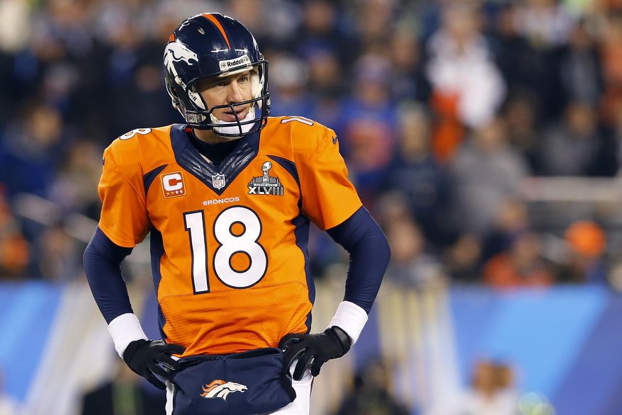 Denver Broncos' Peyton Manning pauses during the second half of the NFL Super Bowl XLVIII football game against the Denver Broncos Sunday, Feb. 2, 2014, in East Rutherford, N.J. (AP Photo/Paul Sancya)