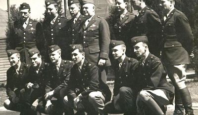 Original members of the Office of Strategic Services — the predecessor of the CIA — pose with Gen. William &quot;Wild Bill&quot; Donovan (standing fourth from left), who founded the clandestine organization in 1942. (OSS SOCIETY)