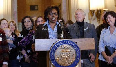 Rep. Rhonda Fields, D-Aurora, speaks at a news conference at the Capitol in Denver on Monday, Feb. 3, 2014, where she urged lawmakers to not recall her bill from last session that required background checks on private gun sales. (AP Photo/Ed Andrieski)