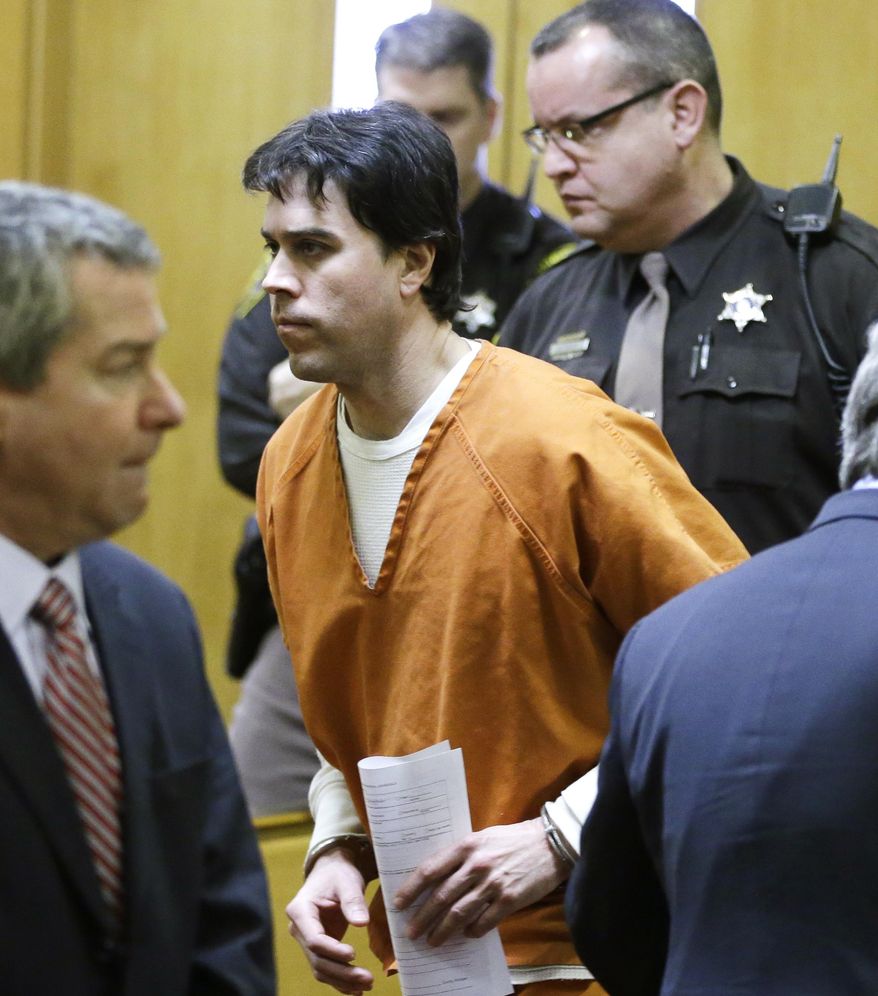 Raulie Casteel, center, leaves Oakland County Circuit Court in Pontiac, Mich., Tuesday, Feb. 4, 2014, after his sentencing for a series of shooting attacks in 2012. Casteel, 44, who opened fire on other motorists in a series of October 2012 attacks that terrified southeastern Michigan was sentenced to more than six years in prison in the first of two related cases. Judge Denise Langford Morris sentenced Raulie Casteel to serve from six years and eight months to 10 years in prison on multiple assault charges, as well as two years for weapons charges. The sentences will run concurrently. (AP Photo/Carlos Osorio)