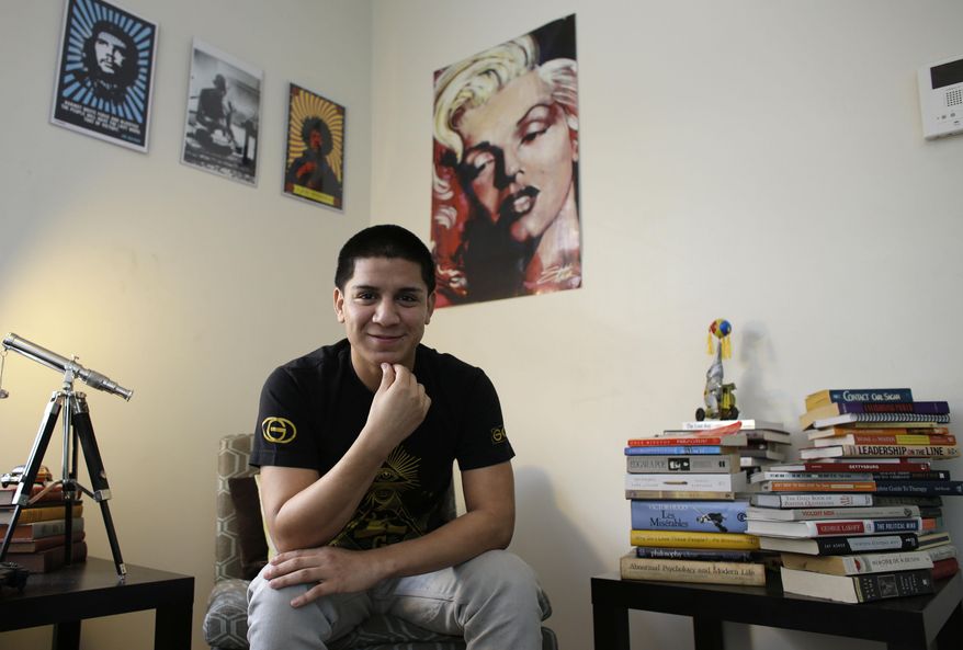 ADVANCE FOR USE SATURDAY, FEB. 8, 2014 AND THEREAFTER - In this Friday, Jan. 10, 2014 photo, Jose Antonio Machado is shown at his home in Miami. "I kind of need my mom," he says. "I should be able to hug her like everybody else." (AP Photo/Lynne Sladky)