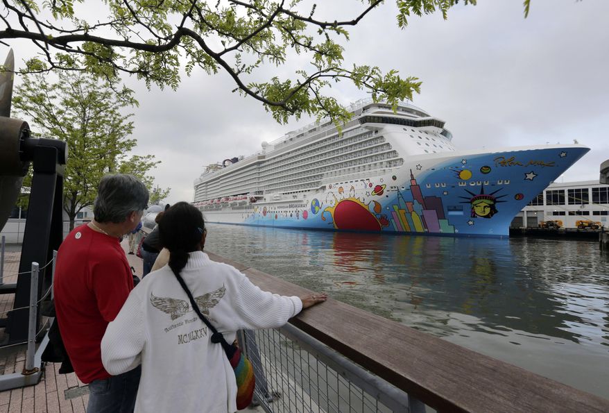 FILE - In this May 8, 2013, file photo, people pause to look at Norwegian Cruise Line's new ship, Norwegian Breakaway, on the Hudson River, in New York. A 4-year-old child died after being pulled unresponsive from a swimming pool on the Norwegian Breakaway, off the coast of North Carolina on Monday, Feb. 3, 2014, cruise line and Coast Guard officials said. Crew members were able to revive a 6-year-old boy also found in the pool. He was airlifted to a hospital, where his condition was unknown. (AP Photo/Richard Drew, File)