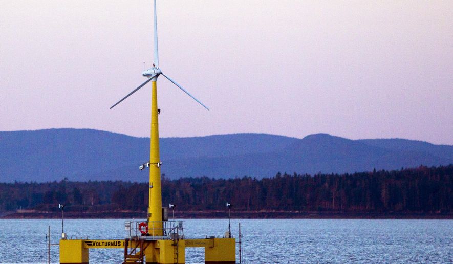 FILE - This Friday, Sept. 20, 2013 file photo shows the country's first floating wind turbine works off the coast of Castine, Maine. Oregon and federal officials are announcing a new effort to tap into offshore wind energy resources in federal waters along the West Coast. Gov. John Kitzhaber, U.S. Secretary of the Interior Sally Jewell and Bureau of Ocean Energy Management Director Tommy Beaudreau are making the announcement at a press conference Wednesday, Feb. 5, 2014. (AP Photo/Robert F. Bukaty, File)