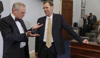 Congressional Budget Office (CBO) Director Douglas Elmendorf, right, talks with House Budget Committee member Rep. Earl Blumenauer, D-Ore. on Capitol Hill in Washington, Wednesday, Feb. 5, 2014, prior to Elmendorf testifying before the committee&#39;s hearing on the CBO budget and economic outlook. New estimates that President Barack Obama’s health care law will encourage millions of Americans to leave the workforce or reduce their work hours have touched off an I-told-you-so chorus from Republicans, who’ve claimed all along that the law will kill jobs.  (AP Photo/J. Scott Applewhite)