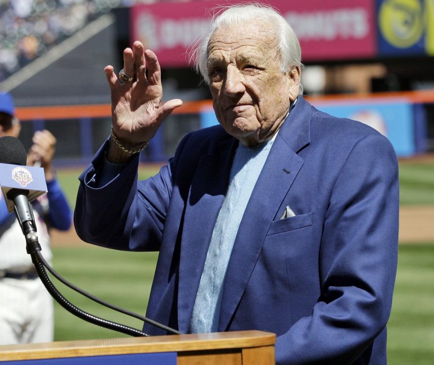 FILE - In this April 5, 2012 file photo, Hall of Famer Ralph Kiner waves to the crowd before announcing the New York Mets starting line-up before an opening day baseball game against the Atlanta Braves at Citi Field in New York. The baseball Hall of Fame says slugger Ralph Kiner has died. He was 91. The Hall says Kiner died Thursday, Feb. 6, 2014, at his home in Rancho Mirage, Calif.WLD (AP Photo/Frank Franklin II, File)