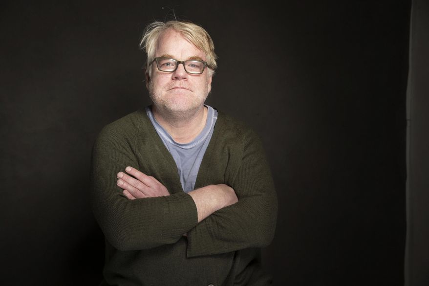 FILE - In this Jan. 19, 2014 file photo, Philip Seymour Hoffman poses for a portrait at The Collective and Gibson Lounge Powered by CEG, during the Sundance Film Festival, in Park City, Utah. Hoffman, 46, who won the Oscar for best actor in 2006 for his portrayal of writer Truman Capote in "Capote," was found dead Sunday, Feb. 2, in his New York apartment. A New York City couple arrested on low-level cocaine possession charges amid the investigation into Philip Seymour Hoffman's death has been released. Lawyers for Juliana Luchkiw  and Max Rosenblum, both 22, say they had nothing to do with Hoffman's death Sunday in a suspected heroin overdose.  (Photo by Victoria Will/Invision/AP, file)