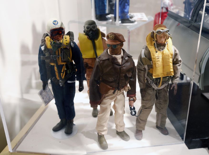** FILE ** This Jan. 31, 2014, photo shows Tuskegee Airmen G.I. Joe action figures in a display at the New York State Military Museum in Saratoga Springs, N.Y. (AP Photo/Mike Groll)