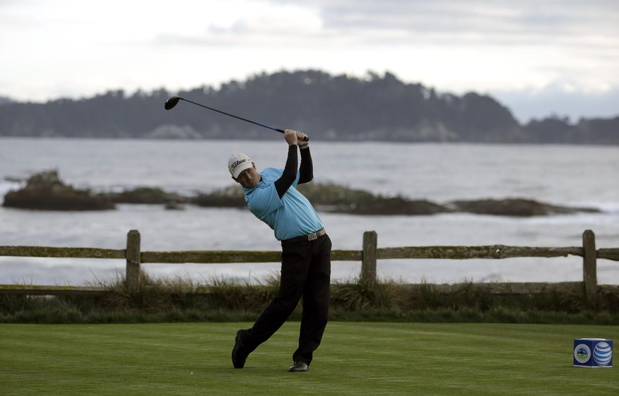 Robert Streb follows through on his shot off the 18th tee on Thursday, Feb. 6, 2014, during the first round of the AT&T Pebble Beach Pro-Am golf tournament on the Pebble Beach Golf Links in Pebble Beach, Calif. (AP Photo/Ben Margot)