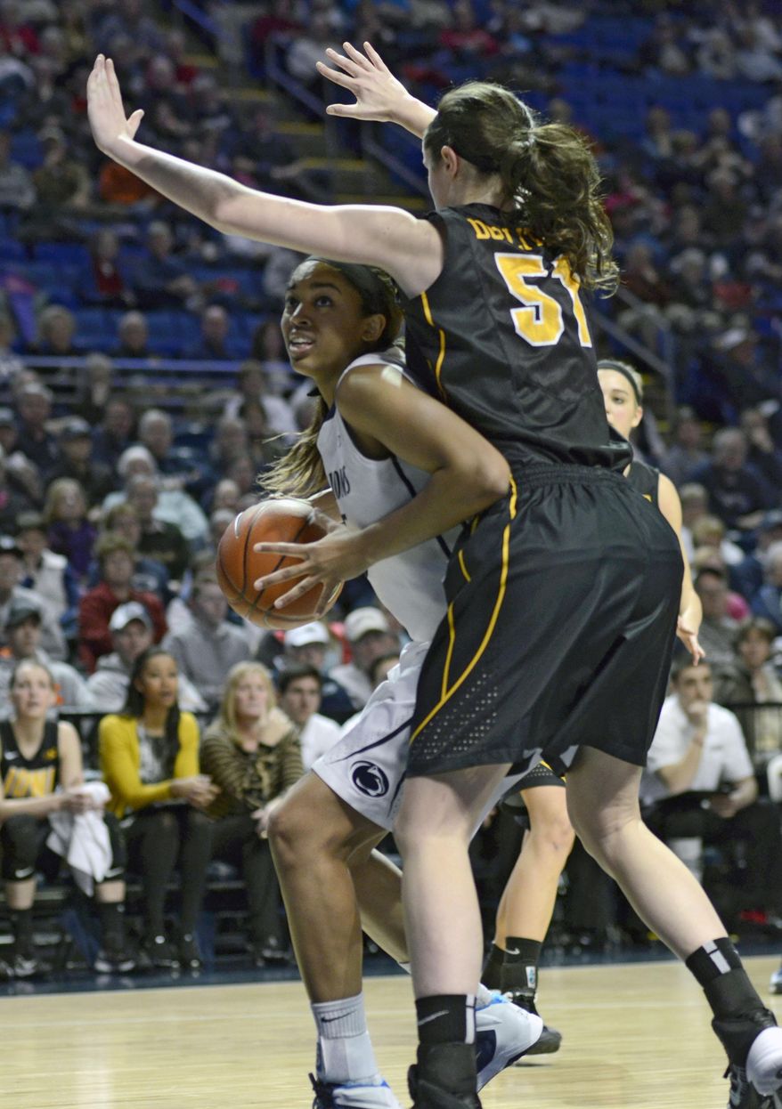 Penn State's Peyton Whitted (25) works around Iowa's Bethany Doolittle (51) during the first half of an NCAA college basketball game on Thursday, Feb. 6, 2014 in State College, Pa. (AP Photo/Ralph Wilson)