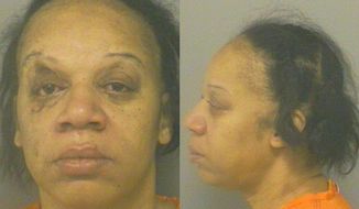 This photo provided by Calhoun County Sheriff Department, Cheryl White is shown.  White, 50,  of Battle Creek, Mich.,  is charged with assault with intent to murder. Police say she stabbed 63-year-old Thomas Blige in the neck, arm and side on Jan. 23 outside his Battle Creek apartment. He&#39;s hospitalized and police say he&#39;s expected to recover. Police say Blige was attacked while confronting White, who was deflating his vehicle tires.   White is being held on $500,000 bond. Thomas Blige is the father of singer Mary J. Blige.   (AP Photo/Calhoun County Sheriff Department)